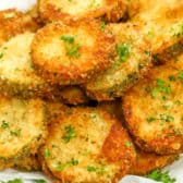 Fried Zucchini served on a white plate